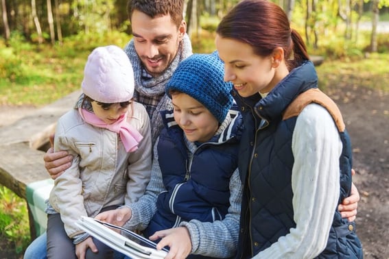 Family outdoors in the woods 