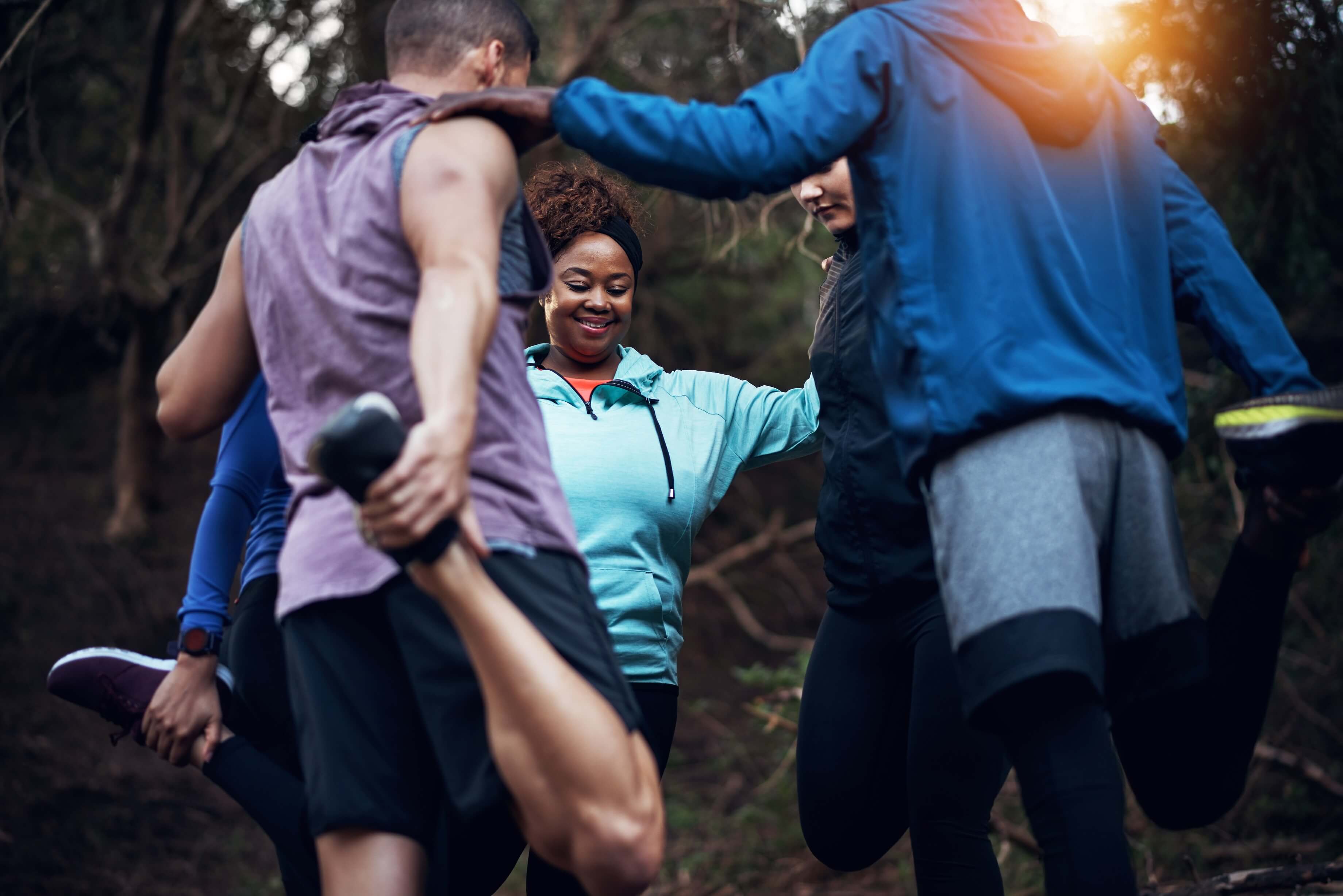 Group of people exercising together in the park