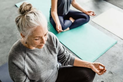 Senior lady pratcising mindfulness meditation