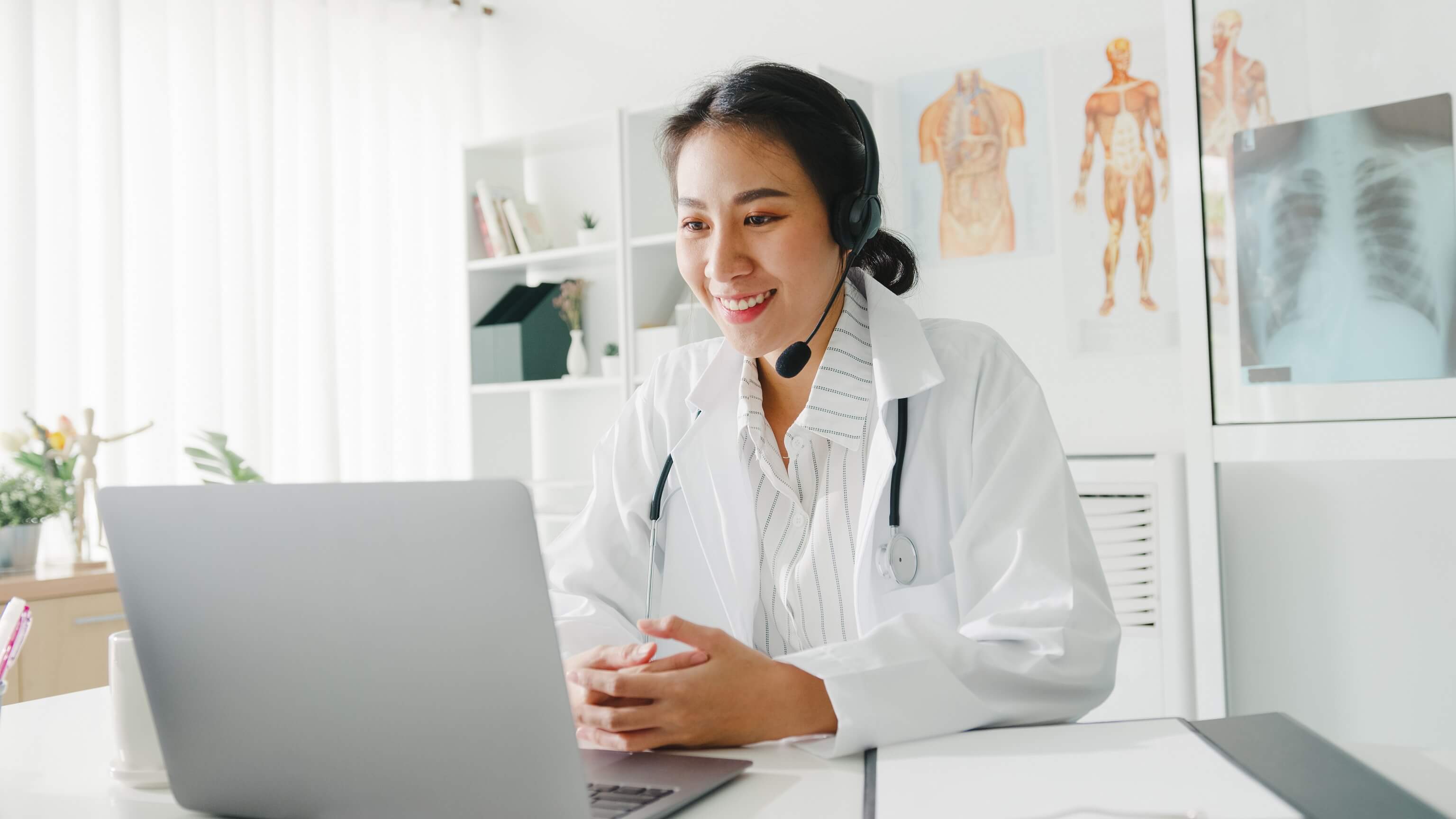 young-lady-doctor-using-computer-laptop-talk-video-2024-11-02-10-30-30-utc (1)