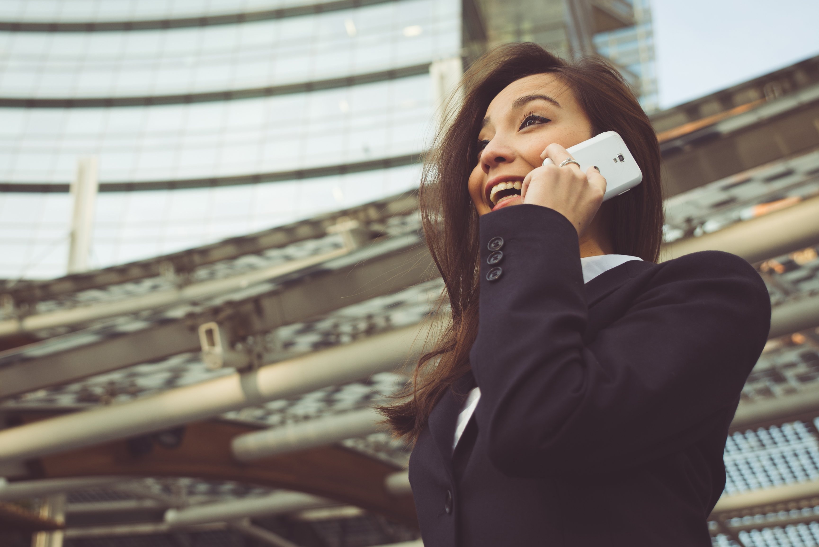 business-woman-making-a-phone-call-outside-the-off-2021-09-04-09-16-47-utc