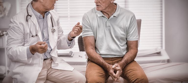 doctor-interacting-with-senior-patient-2021-08-30-06-01-08-utc