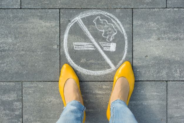 female-feet-with-picture-no-smoking-painted-on-the-2022-04-08-01-55-46-utc