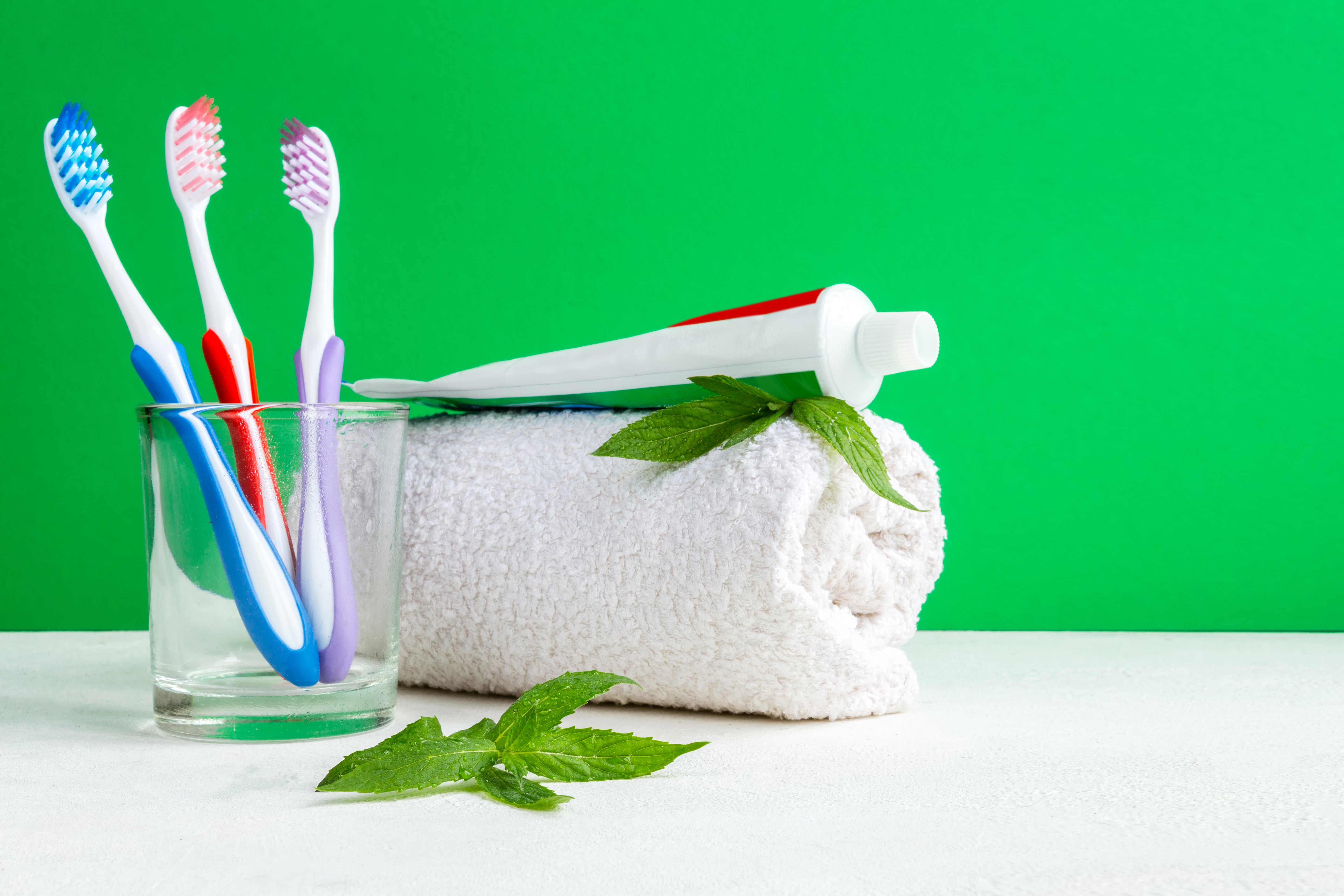 healthy-teeth-toothbrush-in-a-glass-and-toothpast-2021-10-21-04-03-56-utc