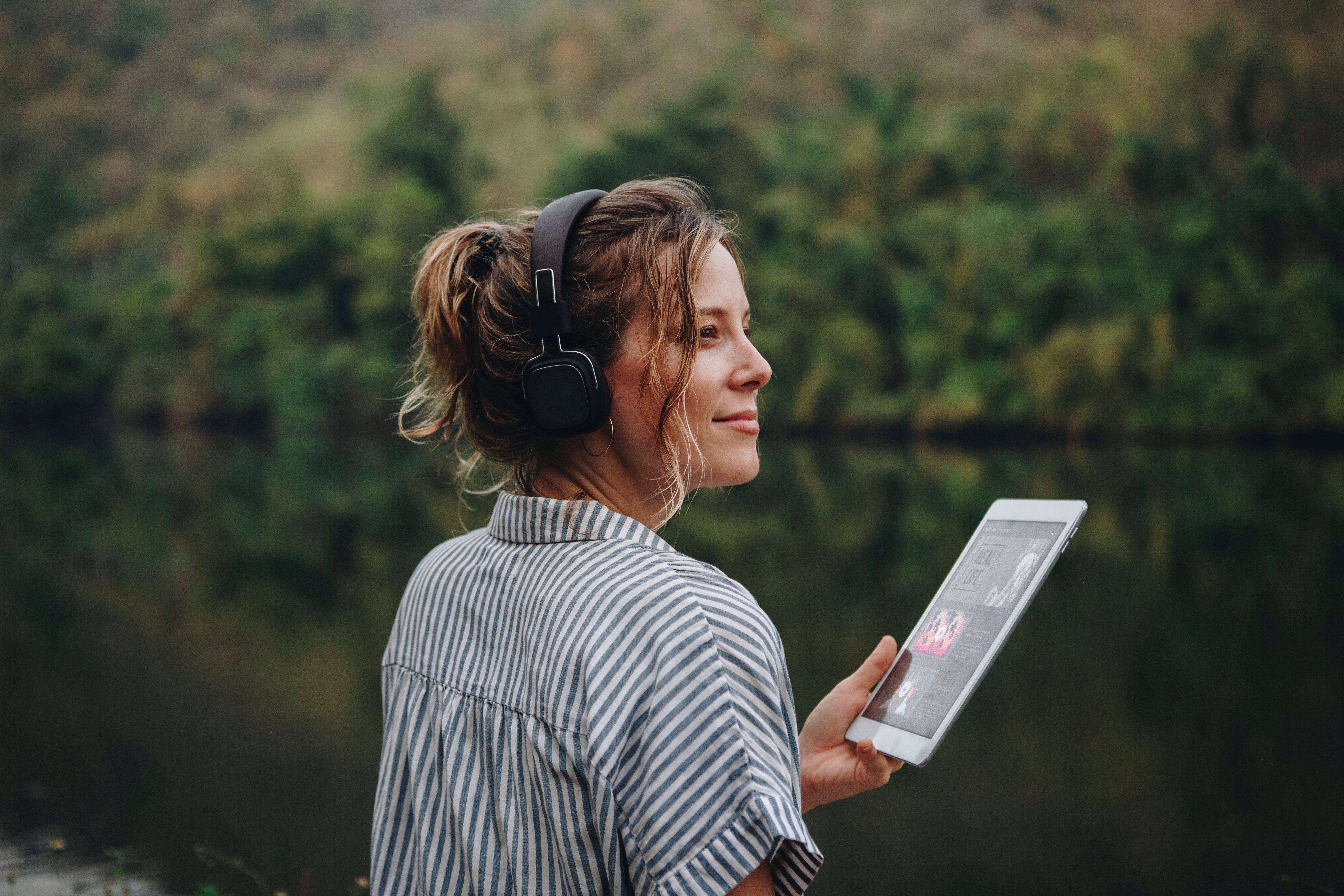 woman-alone-in-nature-listening-to-music-with-head-2022-12-16-00-25-50-utc
