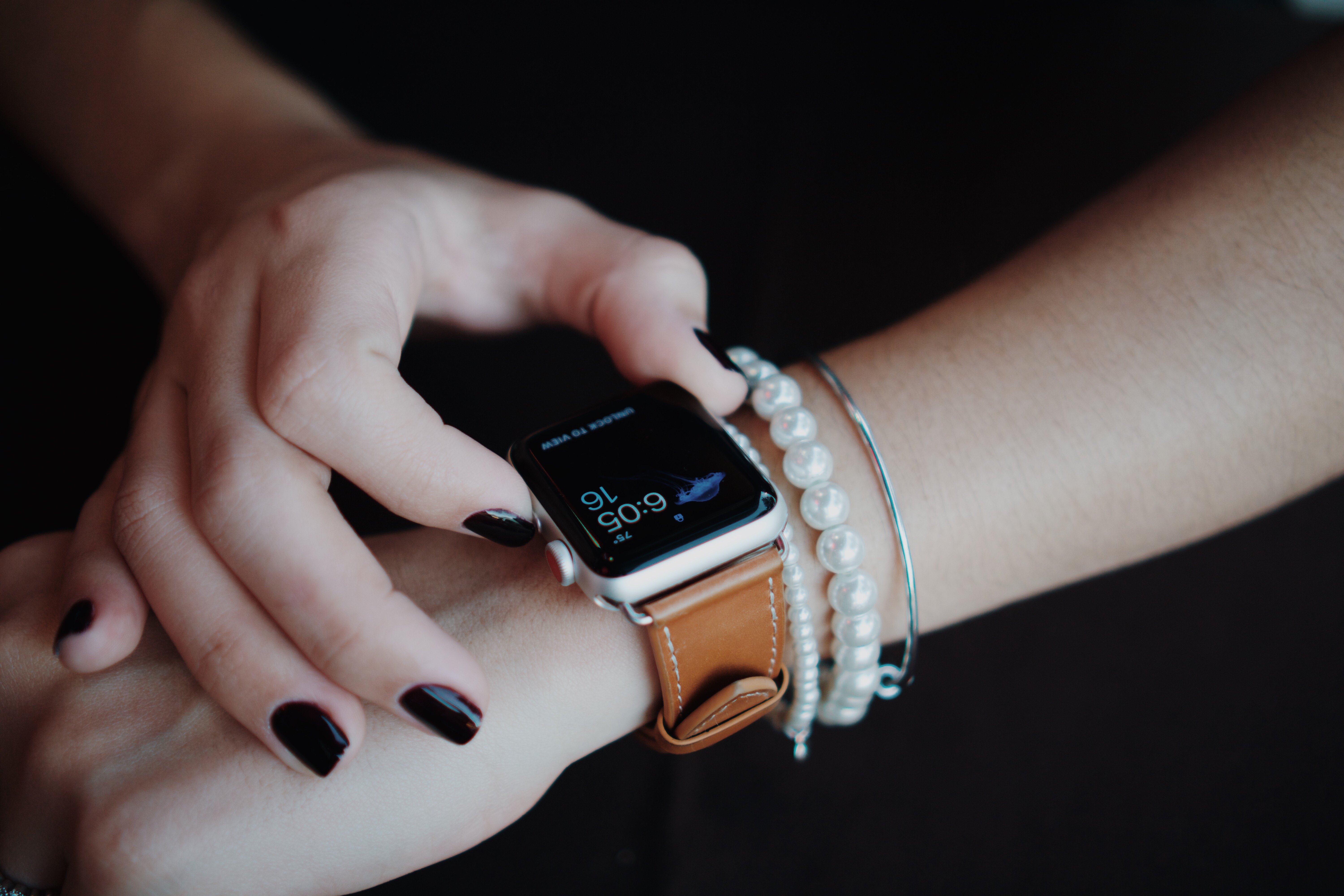 woman-using-smart-watch-2022-11-15-21-05-21-utc